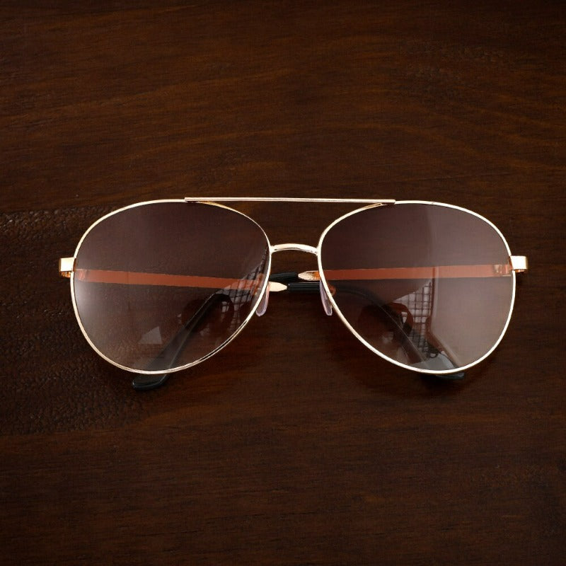 Goldene Sonnenbrille mit braunen Gläsern von KleinSelect im ritual geschenkset